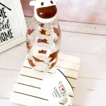 خرید شیشه شیر طرح گاو قهوه ای