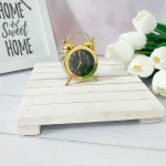 ساعت فلزی زنگ‌دار مشکی طلایی کوچک